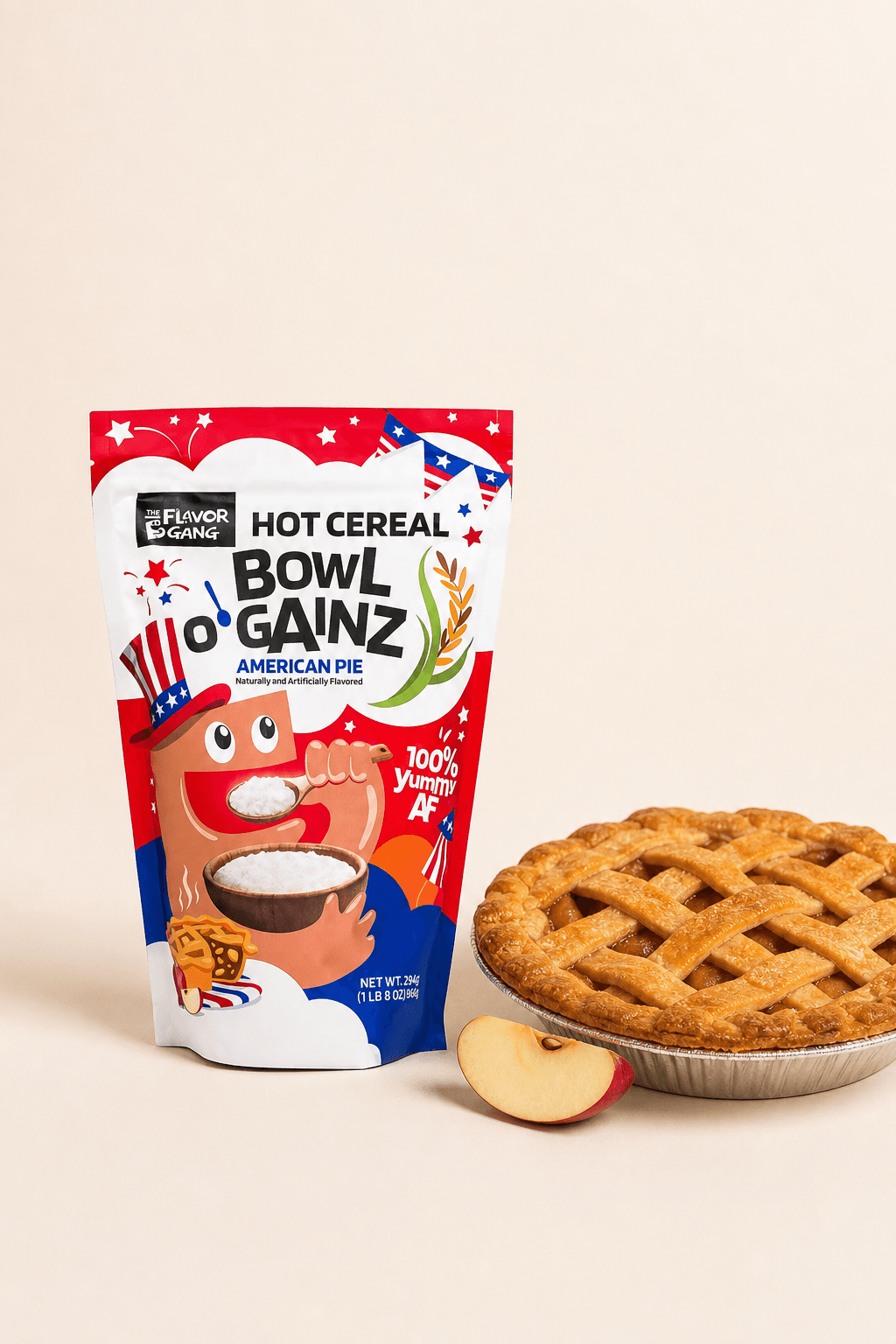The Flavor Gang Bowl O' Gainz American Pie cream of rice pouch beside a lattice-topped apple pie and fresh apple slice.